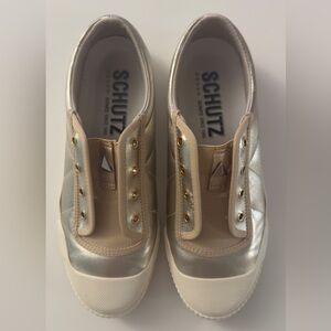 SCHUTZ Metallic Gold Slip-On Sneakers with Gold Eyelets
